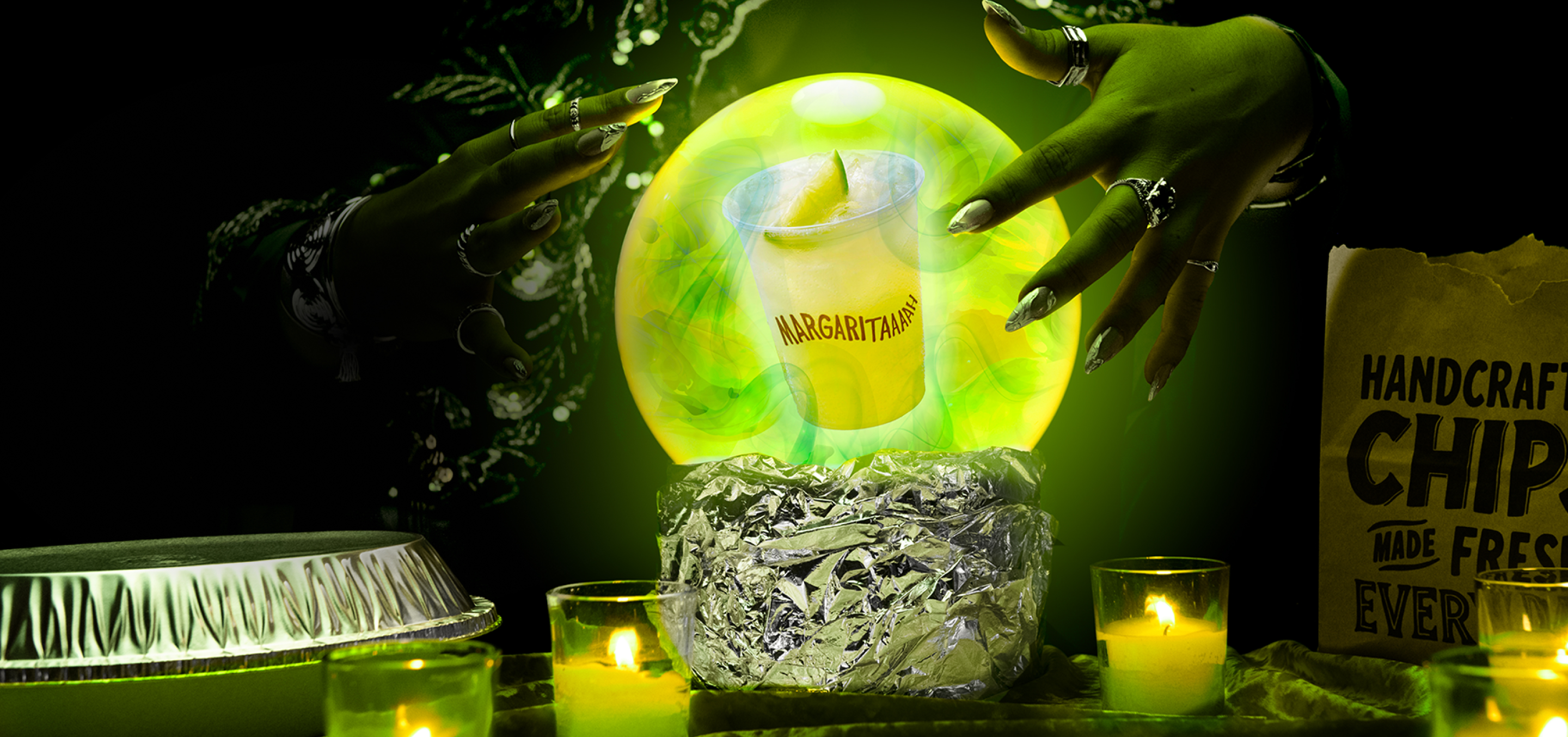A delicious Chipotle Margarita floats within a crystal ball.